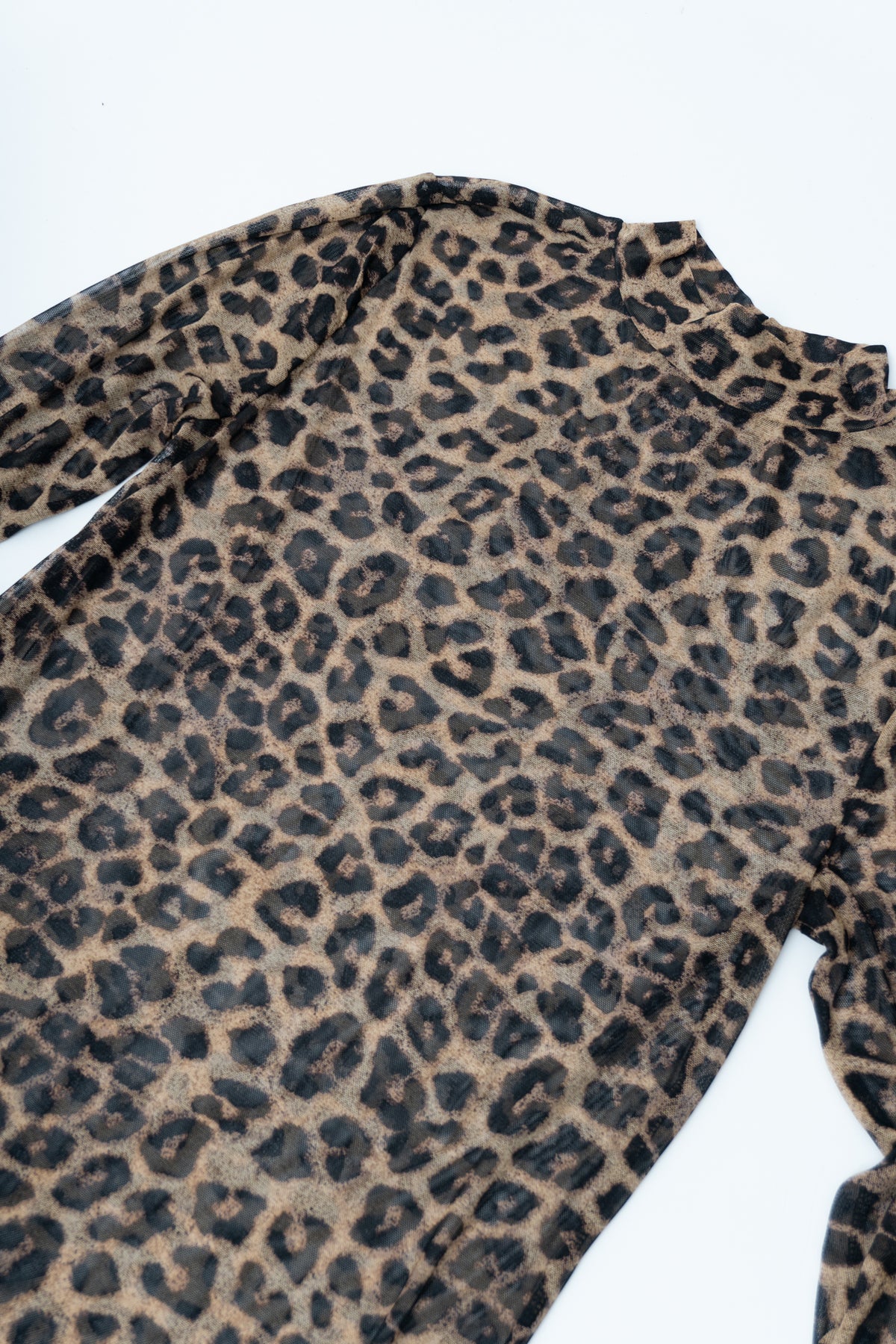 Sheer Animal Print Mock Neck Top